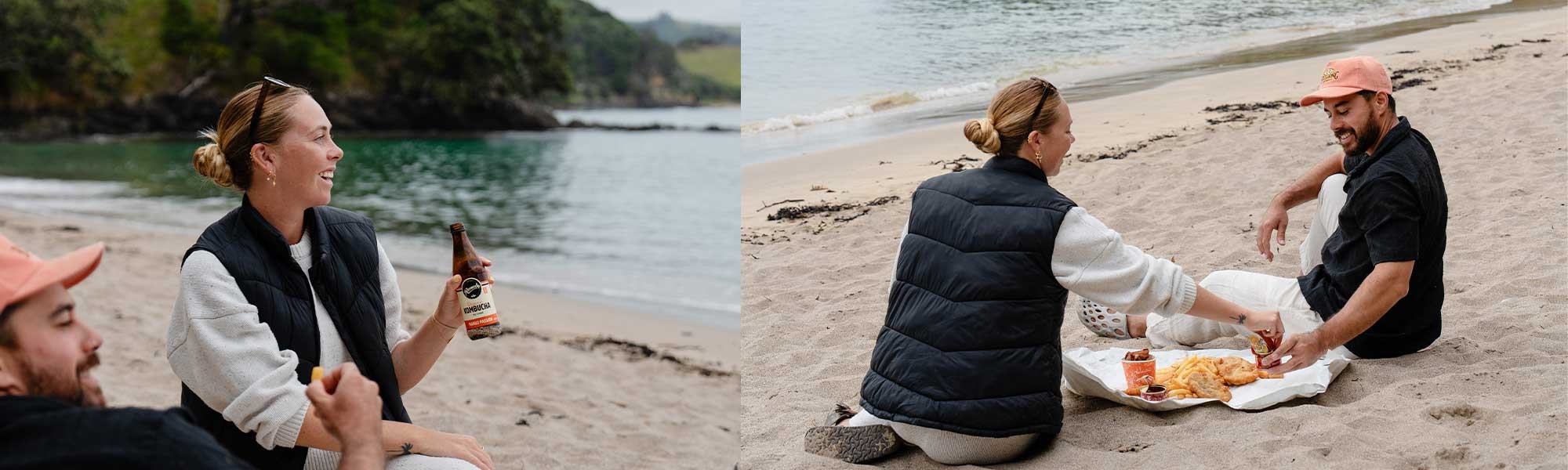 Two people share fish & chips at Whale Bay